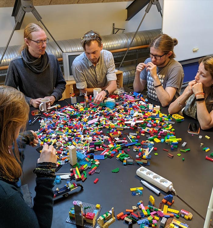 Team doing a LEGO scrum meeting